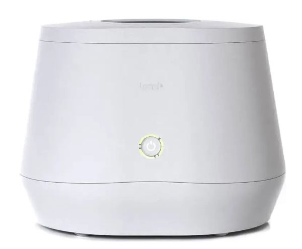 White Lomi Bloom smart composter on a kitchen counter